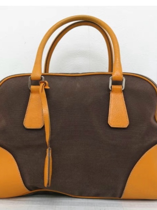 Prada Handbags - Prada Brown Canvas Satchel with yellow Leather Trim